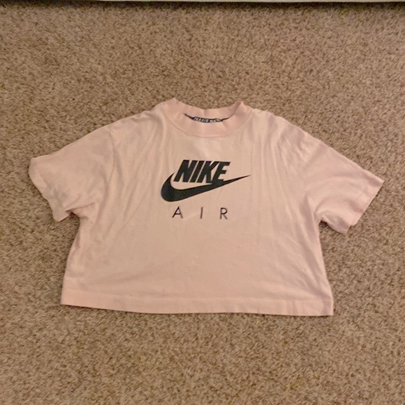 pastel pink nike shirt